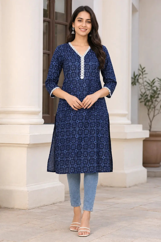 Rabric navy blue cotton long kurti for women with light blue geometric floral print, V neck and white embroidered lace detail, front view
