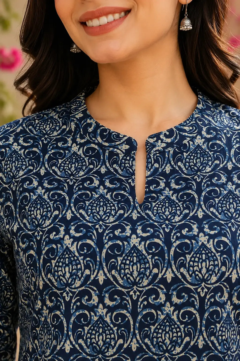 Closeup of stylish neck design on Rabric navy blue cotton printed kurti for women ethnic fashion