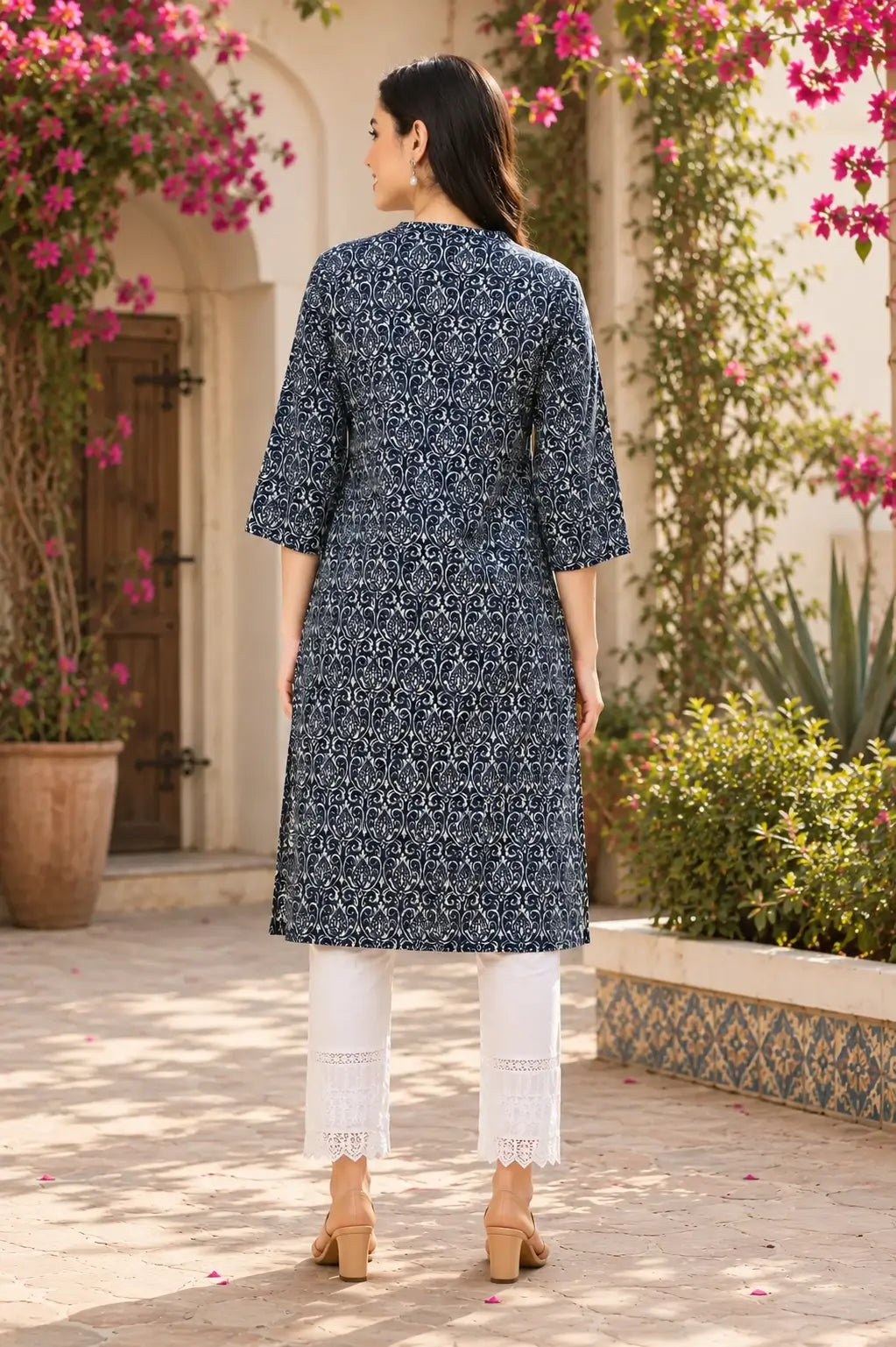 Back view of Rabric navy blue cotton long kurti for women with elegant ethnic print and comfortable straight fit