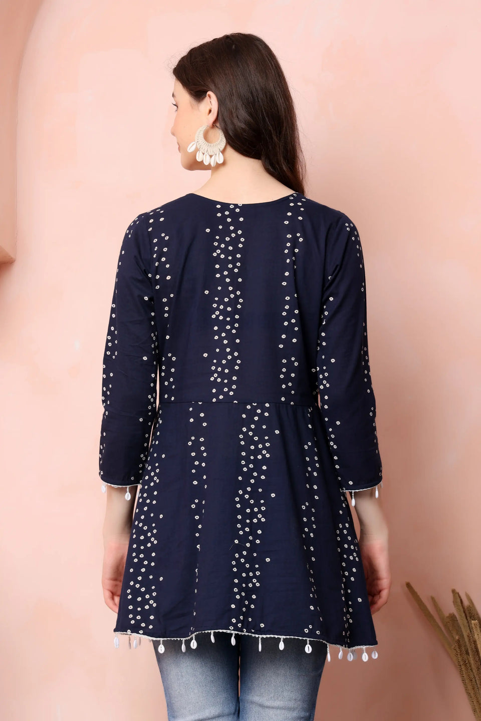 Back view of RABRIC navy blue pure cotton short kurti for women with flared silhouette