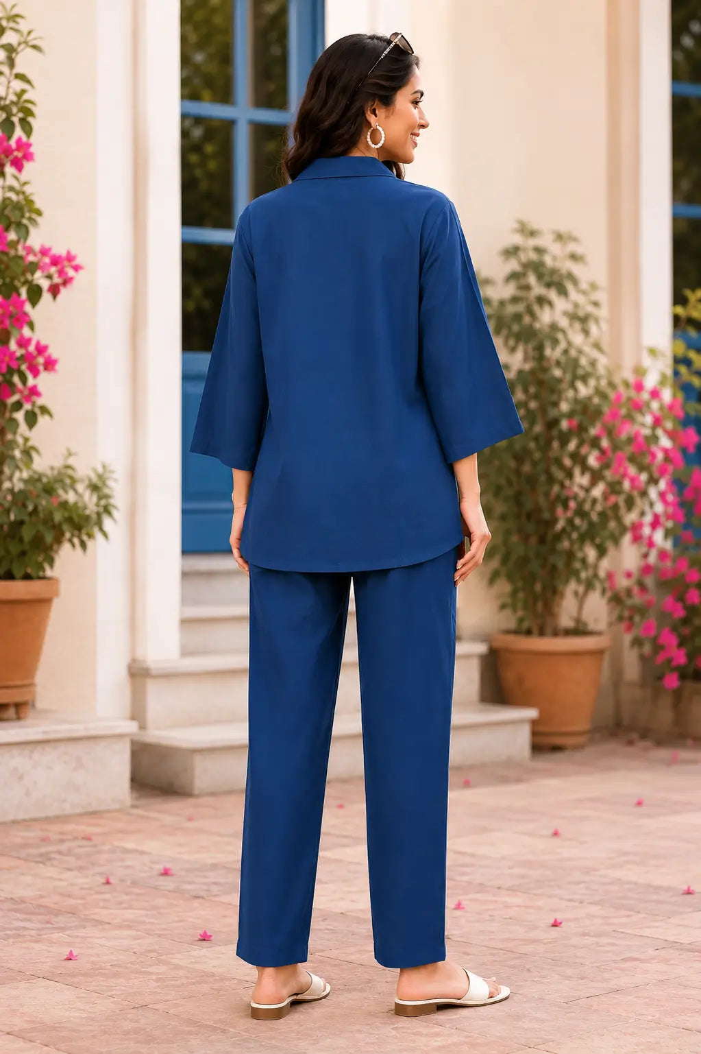 Back view of Rabric navy blue rayon women co-ord set with short shirt, 3/4 sleeves and matching straight pant