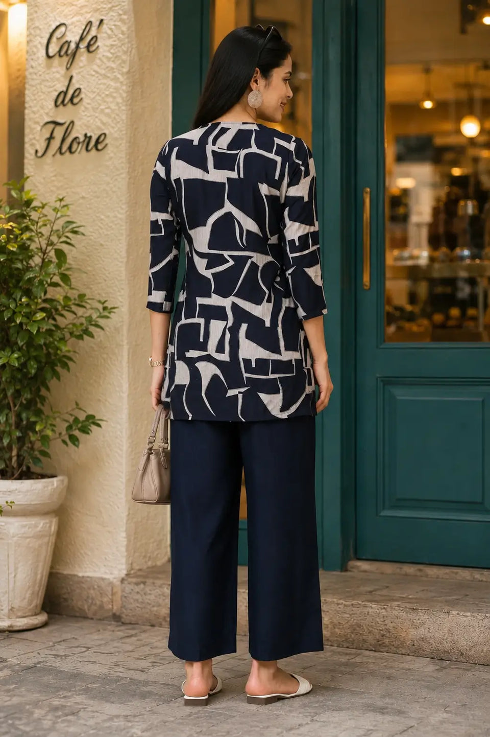 Back view of Rabric navy blue Vertican Silk women co-ord set with beige abstract geometric print short shirt and wide-leg pants