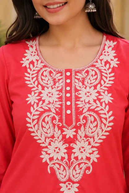 Close up neck design of women cotton embroidered kurti with white floral thread work by Rabric