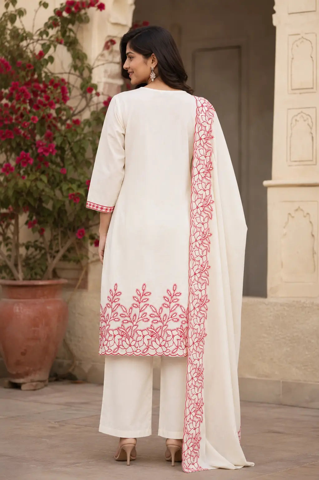 Back side view of Rabric off white cambric cotton kurta pant set with dupatta for women with elegant floral embroidery border