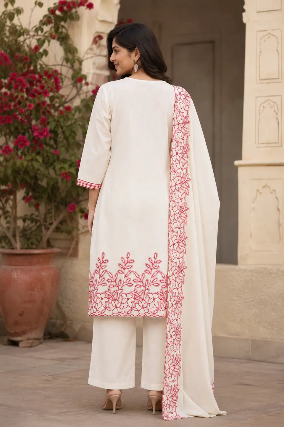 Back side view of Rabric off white cambric cotton kurta pant set with dupatta for women with elegant floral embroidery border