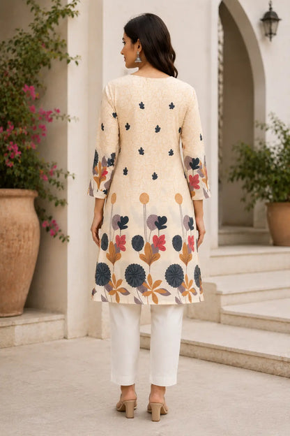 Back side view of Rabric off white cotton floral print women kurti with mid length straight fit design and 3-4 sleeves
