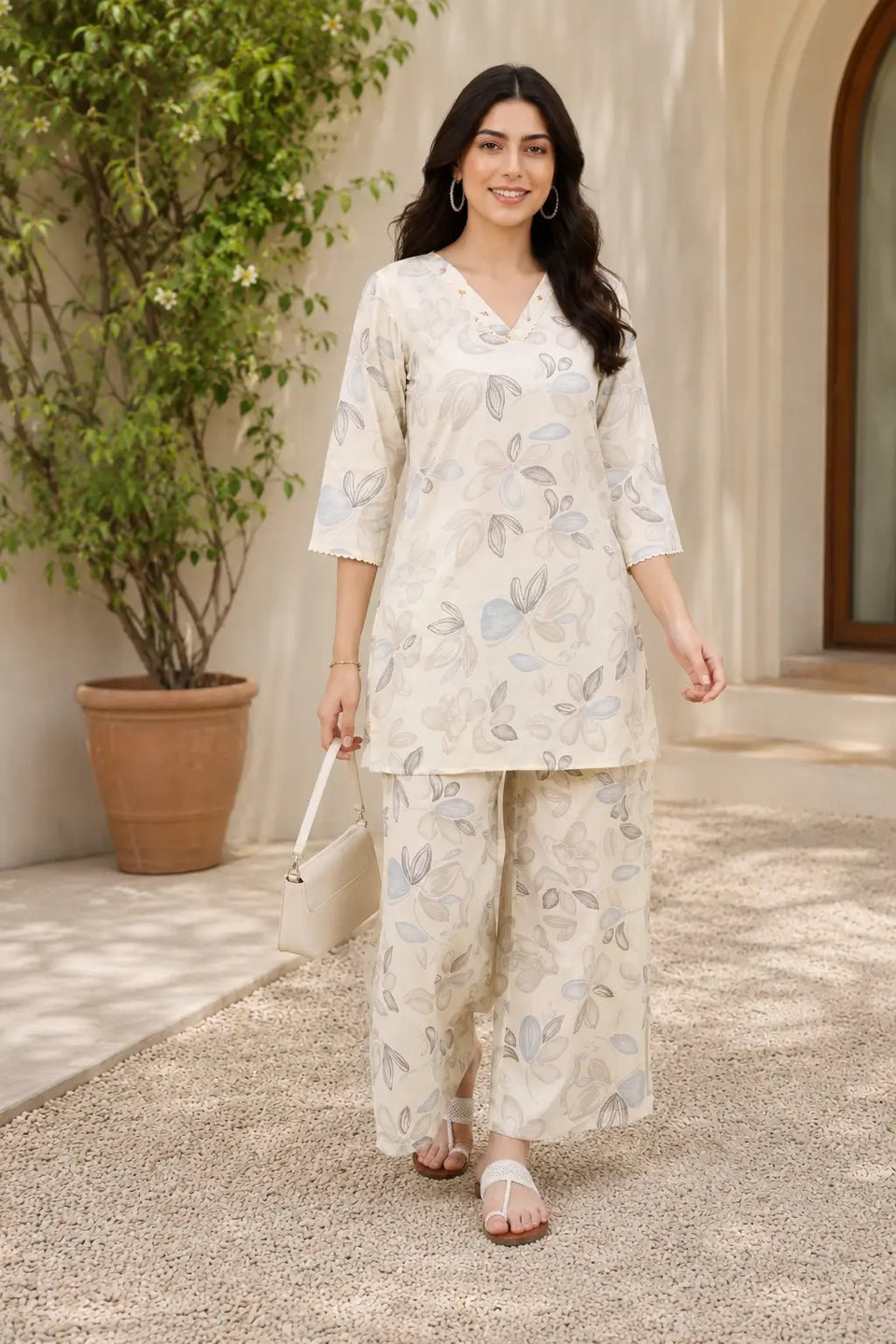 Beautiful Indian woman wearing Rabric off white cotton floral leaf print co-ord set for casual summer outings and daily wear