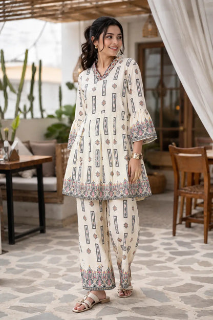 Rabric off white cotton printed co-ord set for women with ethnic floral and geometric print, stylish V-neck short kurta and wide leg pants front view casual summer outfit