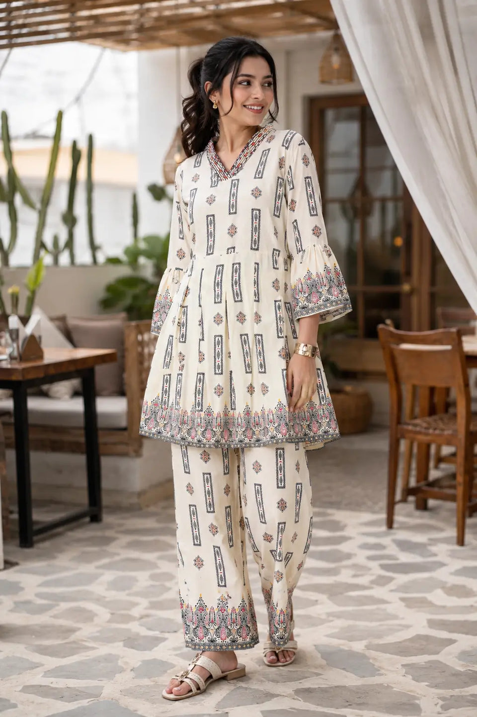 Rabric off white cotton printed co-ord set for women with ethnic floral and geometric print, stylish V-neck short kurta and wide leg pants front view casual summer outfit