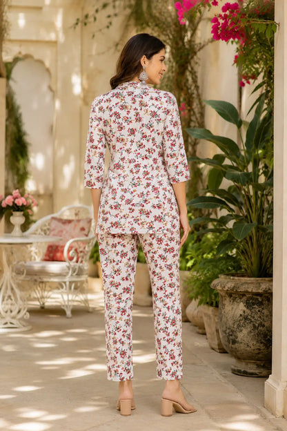 Back view of Rabric women off white floral rayon co-ord set with straight pants and short shirt stylish casual ethnic western wear