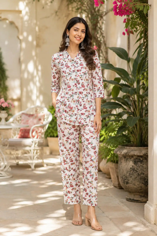 Rabric off white floral rayon co-ord set for women front view stylish summer casual printed shirt and pant set with 3/4 sleeves