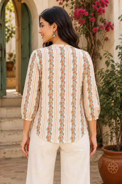 Back view of Rabric off white orange floral printed cotton short top for women with 3/4 elastic sleeves