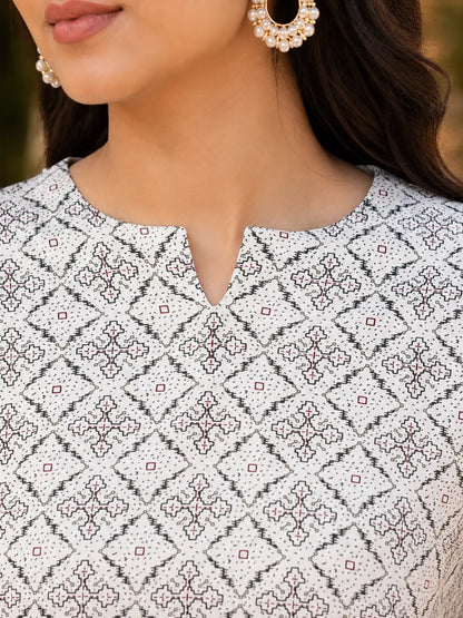 Close up neck design detail of Rabric off white rayon printed kurti with geometric ethnic pattern for women
