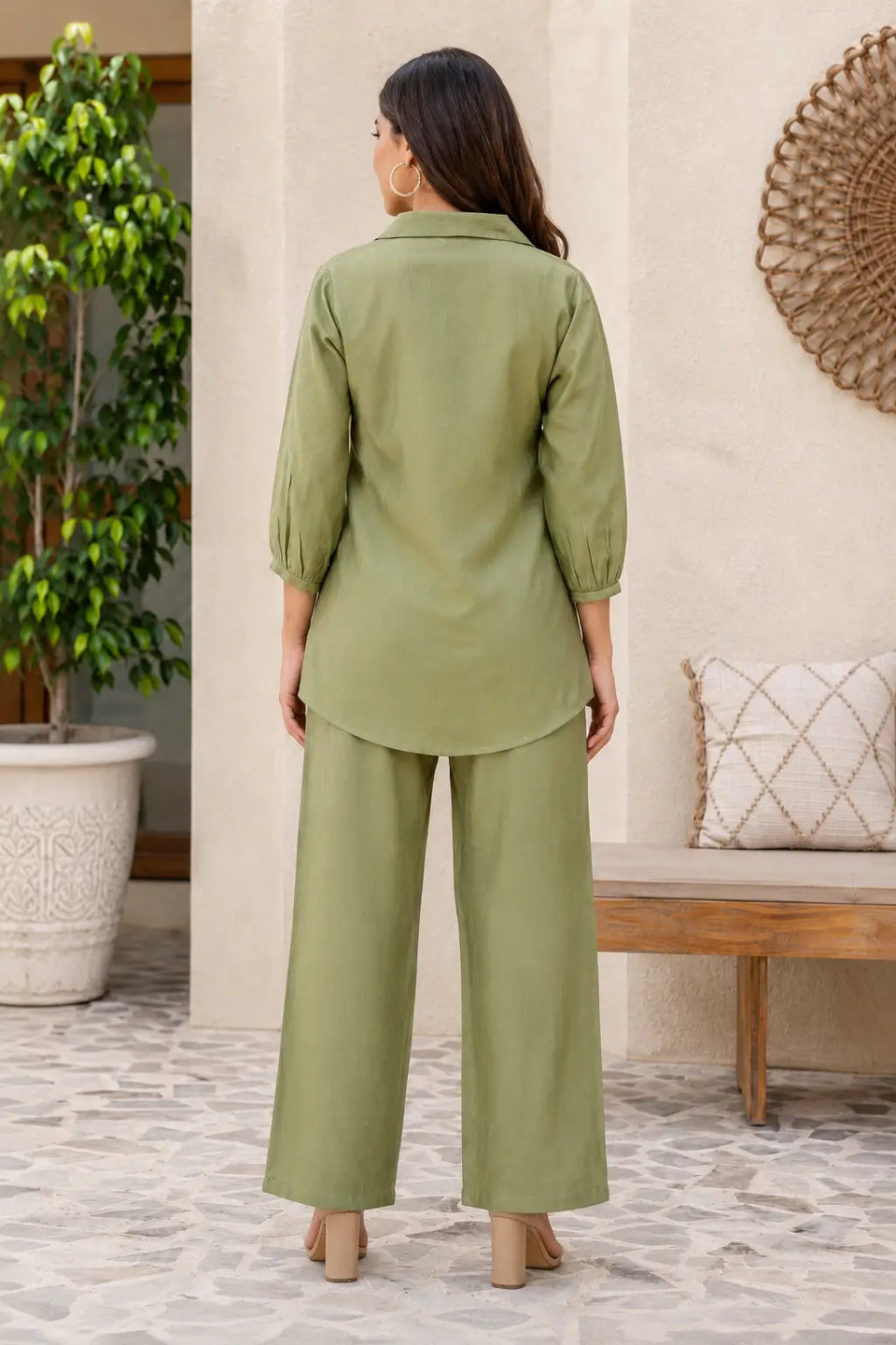 Back view of Rabric olive green cotton co-ord set for women featuring collar neck top, curved hem and wide leg pants