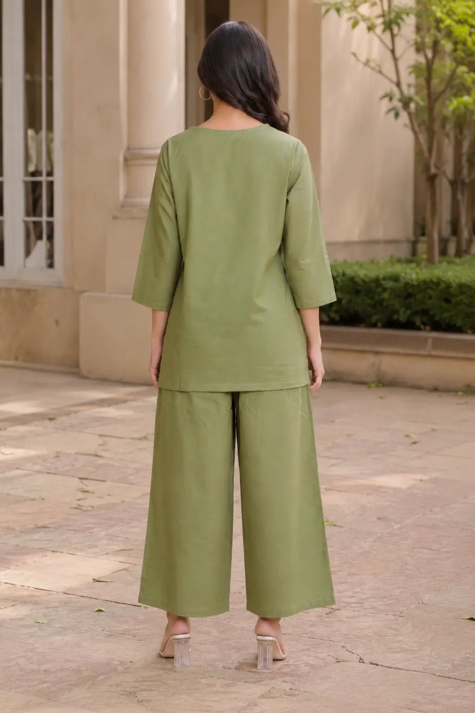 Back view of Rabric olive green cotton co-ord set for women in solid plain cotton fabric with relaxed top and wide palazzo pant