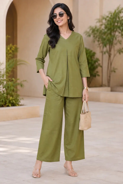 Rabric olive green cotton co-ord set styled with sunglasses for women, solid V-neck front pleat top and wide pajama