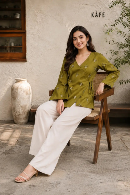 Rabric olive green cotton printed wrap short top for women in casual sitting pose with side dori and full belly sleeves