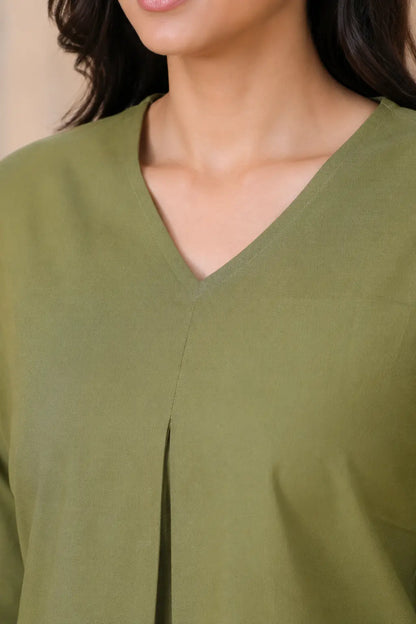Close-up of Rabric olive green cotton co-ord set V-neck design with front pleat and plain solid fabric texture
