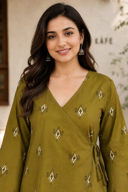 Close up of Rabric olive green cotton printed wrap short top with V neck design and ethnic geometric print