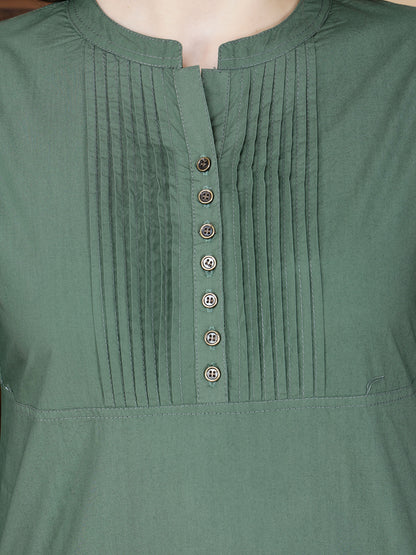 Close-up of pintuck design and brass button details on Rabric Poplin Cotton Kurti