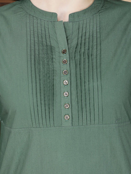 Close-up of pintuck design and brass button details on Rabric Poplin Cotton Kurti