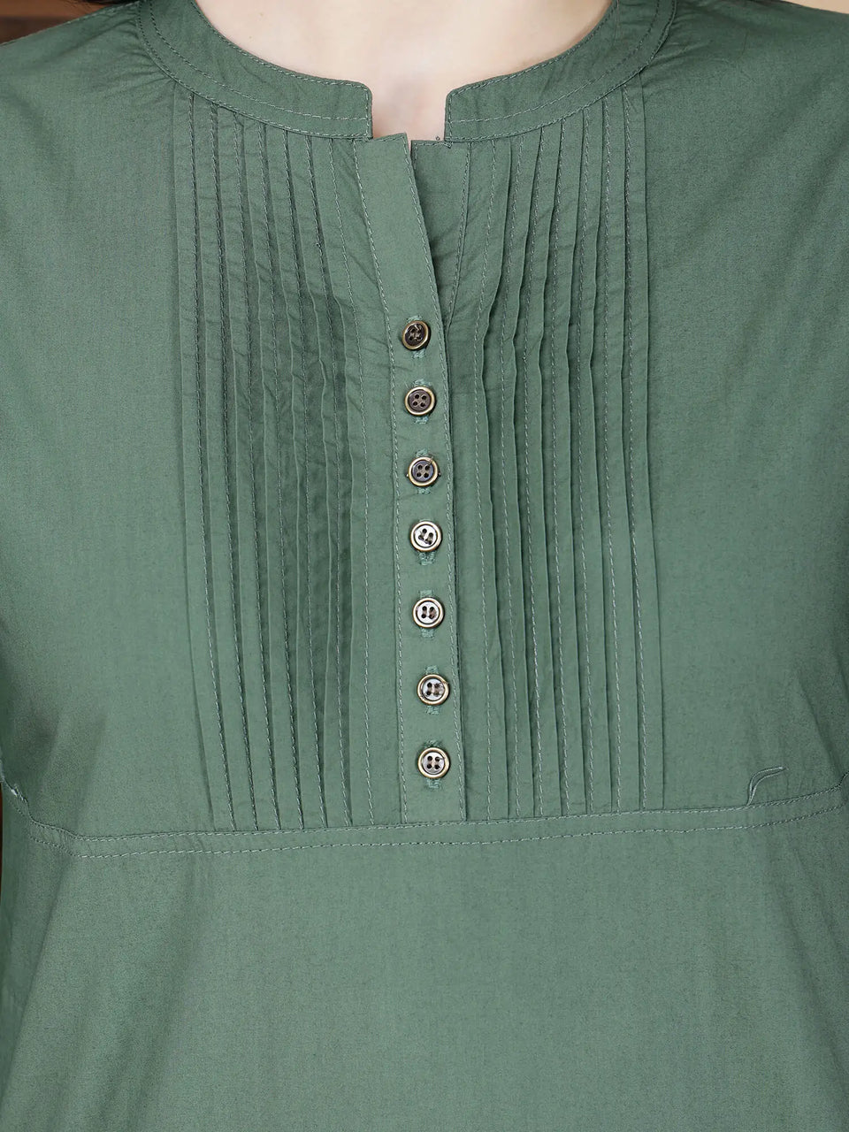 Close-up of pintuck design and brass button details on Rabric Poplin Cotton Kurti