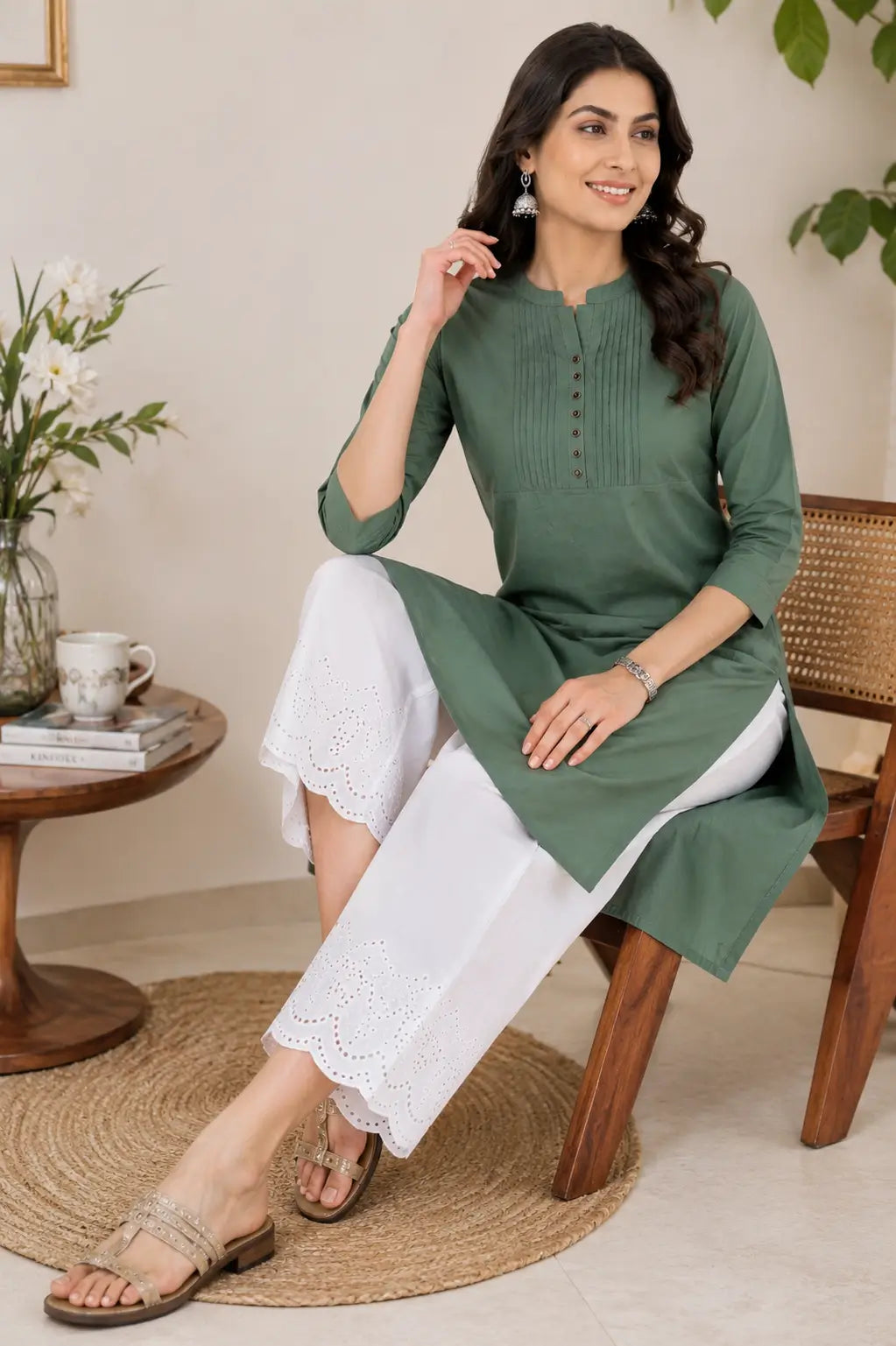 Rabric olive green popline cotton kurti in casual sitting pose with stylish accessories for modern women ethnic fashion