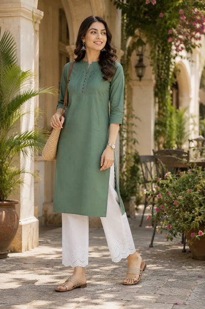 Woman wearing olive green popline cotton kurti with white pants in stylish casual lifestyle ethnic fashion look