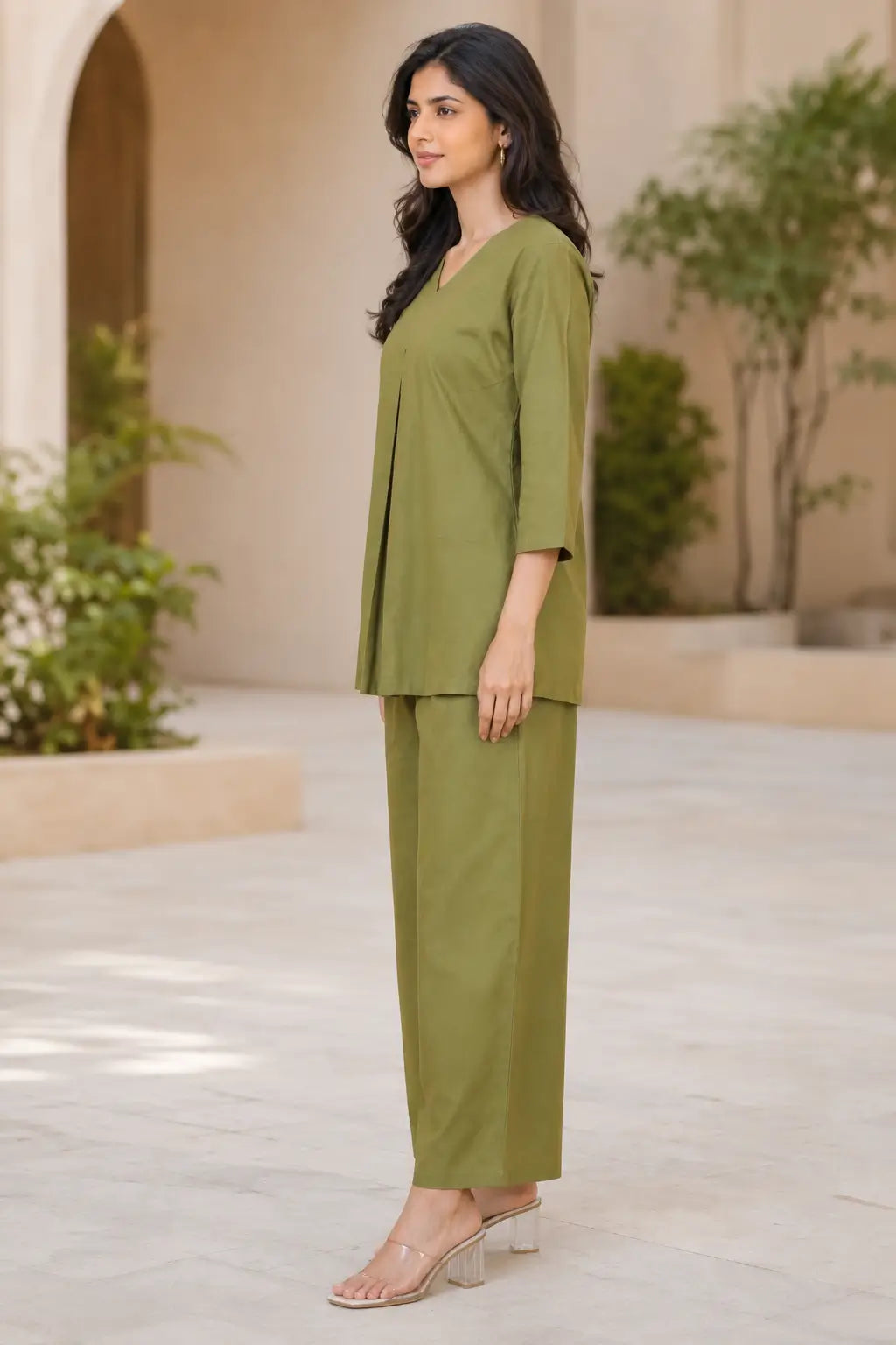 Side view of Rabric olive green solid cotton co-ord set for women with 3/4 sleeve top and wide pajama