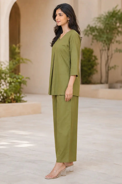 Side view of Rabric olive green solid cotton co-ord set for women with 3/4 sleeve top and wide pajama