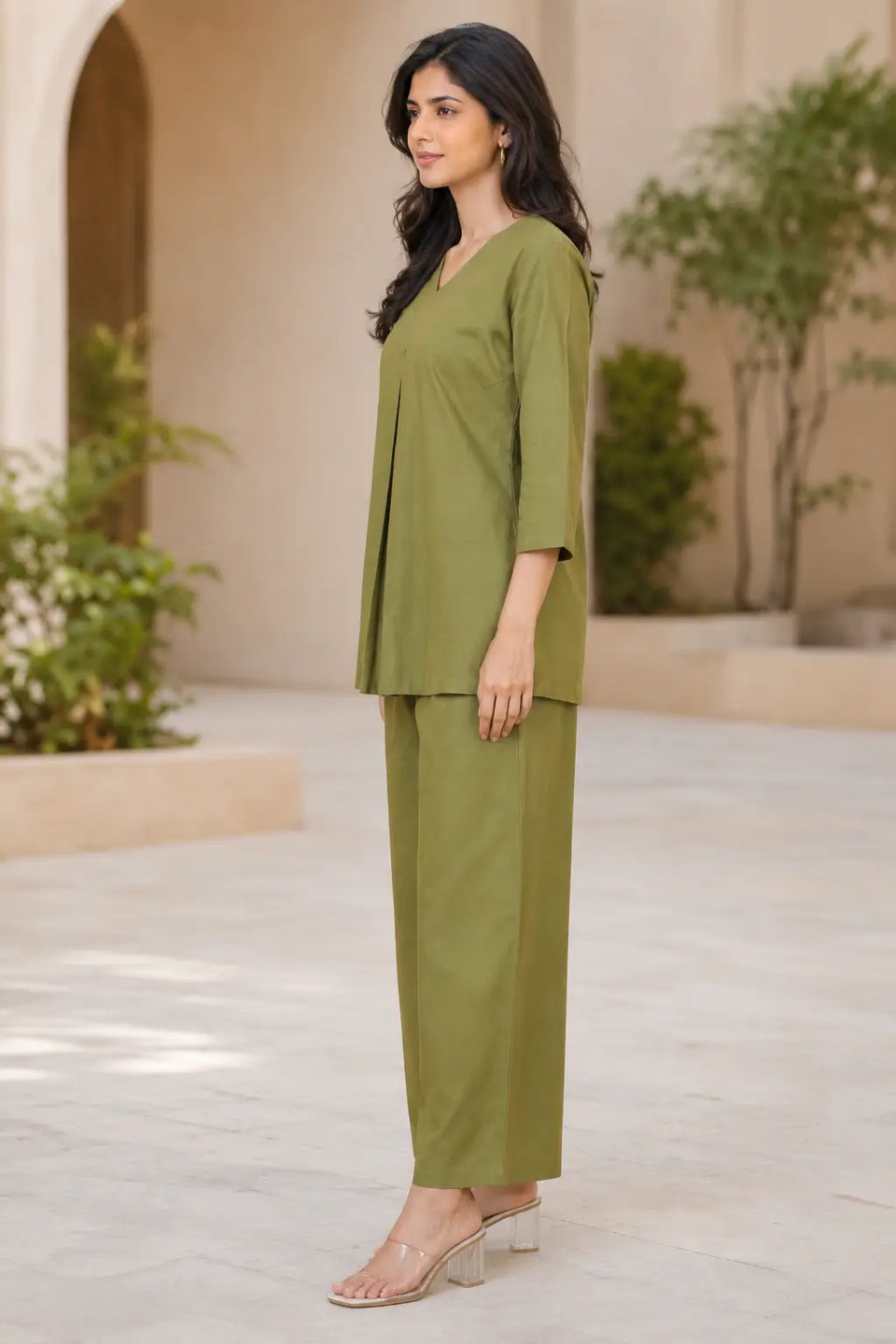 Side view of Rabric olive green solid cotton co-ord set for women with 3/4 sleeve top and wide pajama