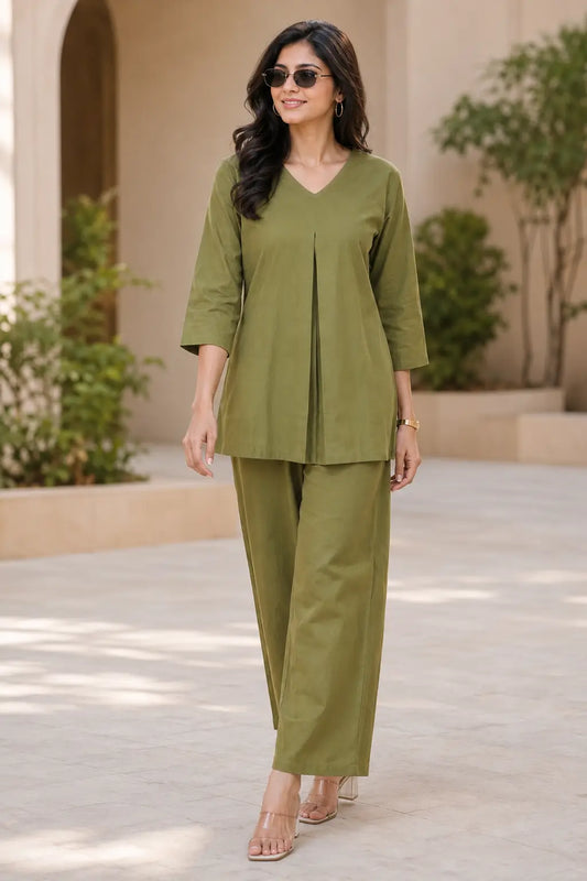 Rabric olive green solid cotton co-ord set for women with V-neck front pleat top and wide pajama, front view