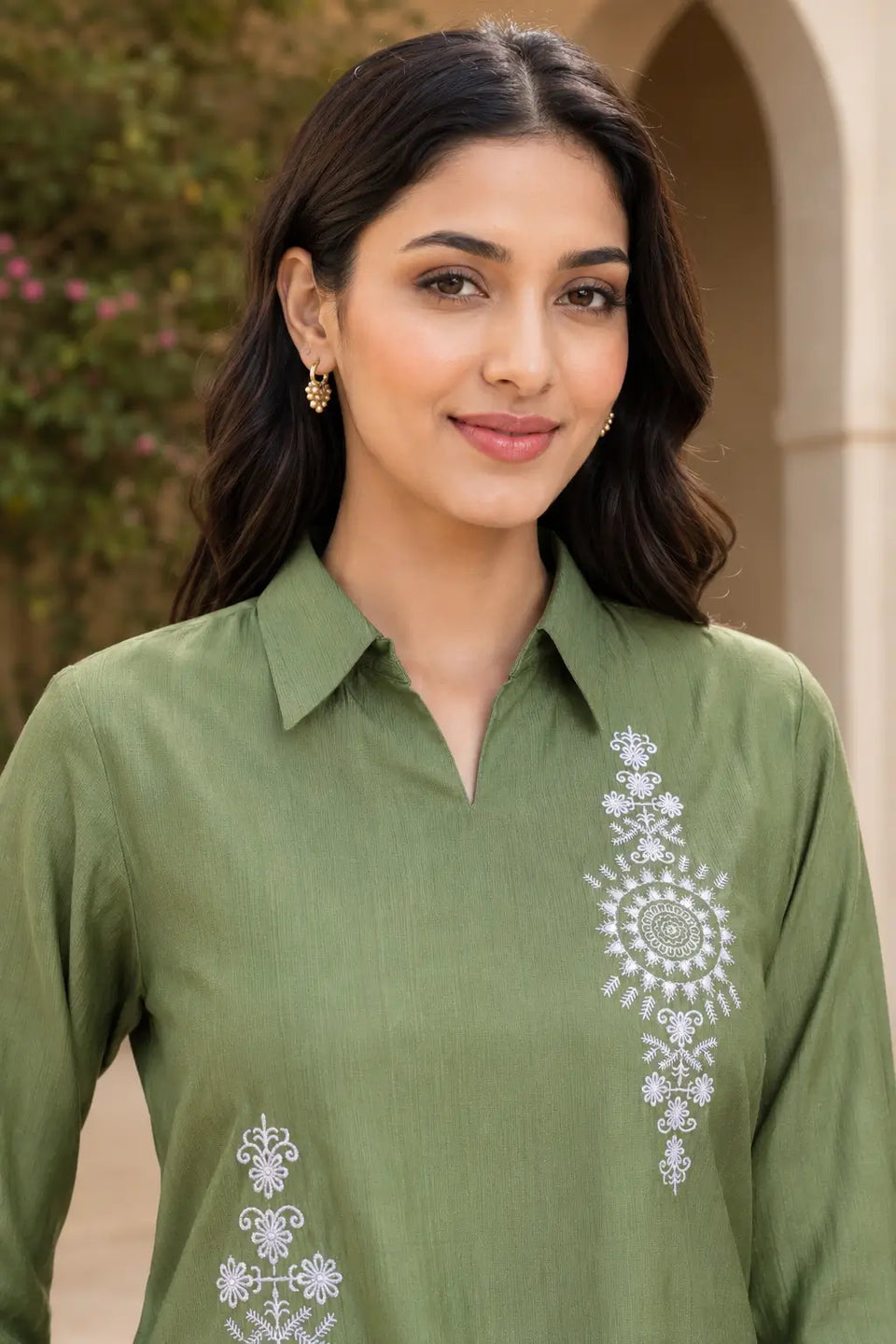 Close-up of Rabric olive green Vertican Silk co-ord set showing collar V-neck design and intricate white floral mandala embroidery
