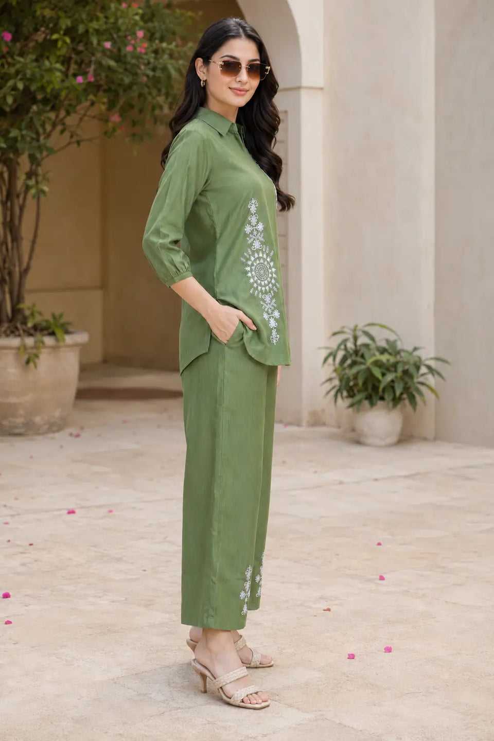 Side view of Rabric olive green Vertican Silk embroidered co-ord set for women with short kurti, wide pajama and white floral embroidery