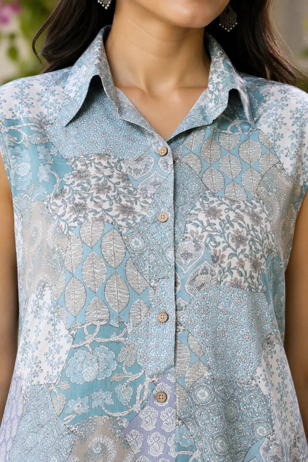Closeup of RABRIC pastel patchwork printed sleeveless kurta with collar neck and button detailing