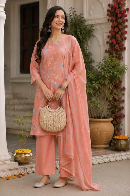 Woman wearing Rabric peach cambric cotton kurta pant set with dupatta in elegant lifestyle ethnic fashion look