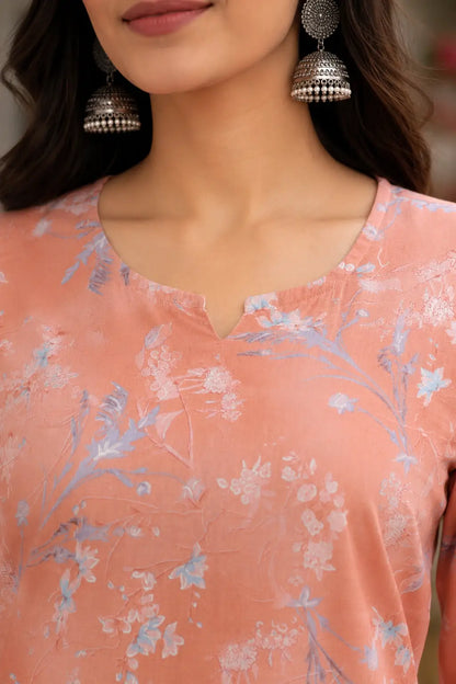 Close up neck design detail of Rabric peach cambric cotton floral kurta for women with elegant round neckline