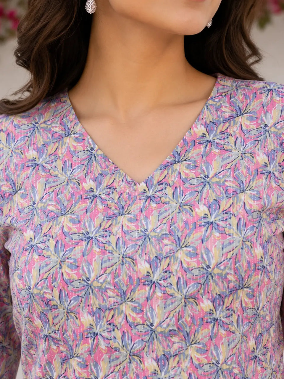 Closeup of Rabric pink floral cotton short top showing elegant V neck design and premium printed cotton fabric texture for women