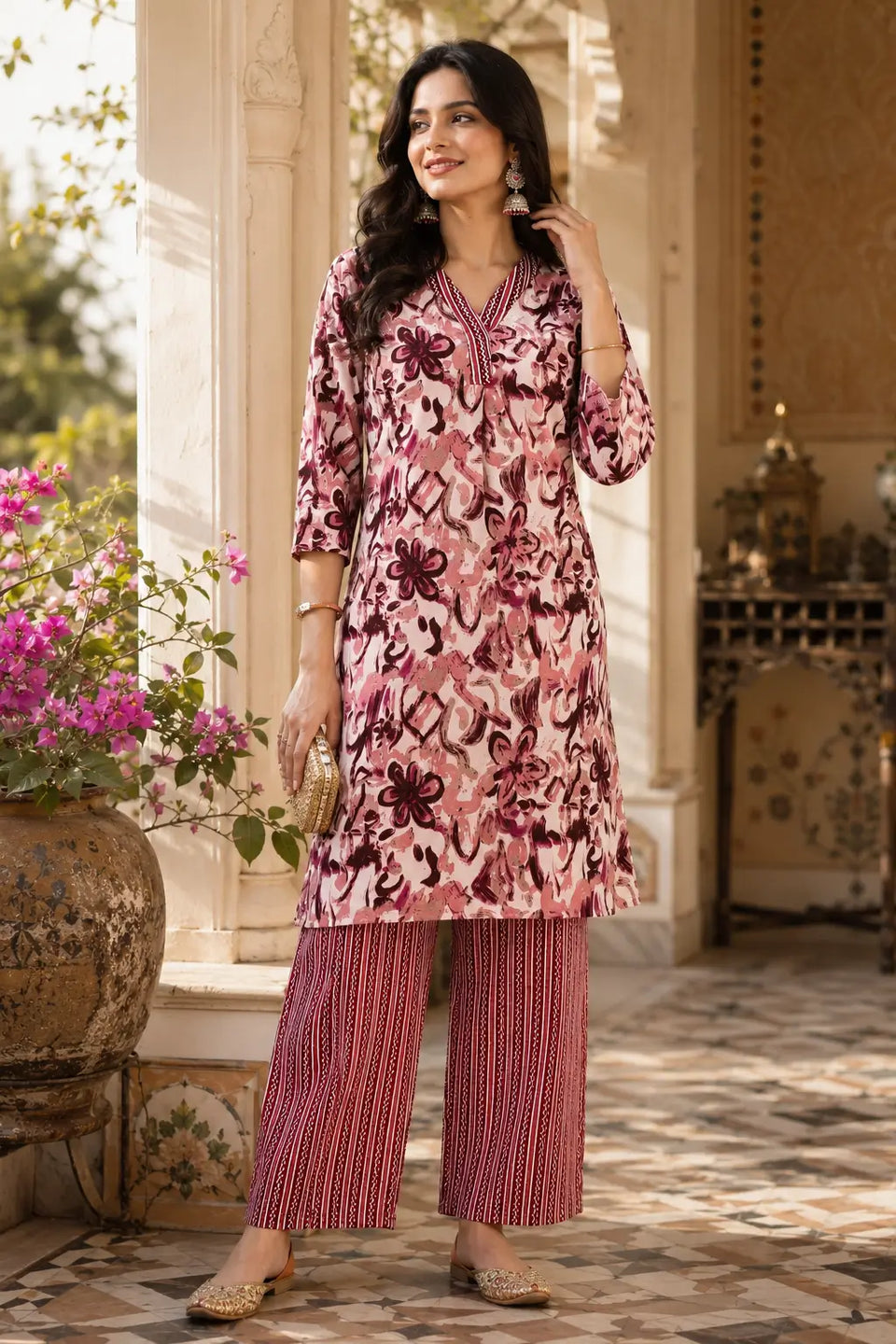 Rabric women pink and maroon cotton floral kurta pant set front view with 3/4 sleeves and straight pants ethnic wear