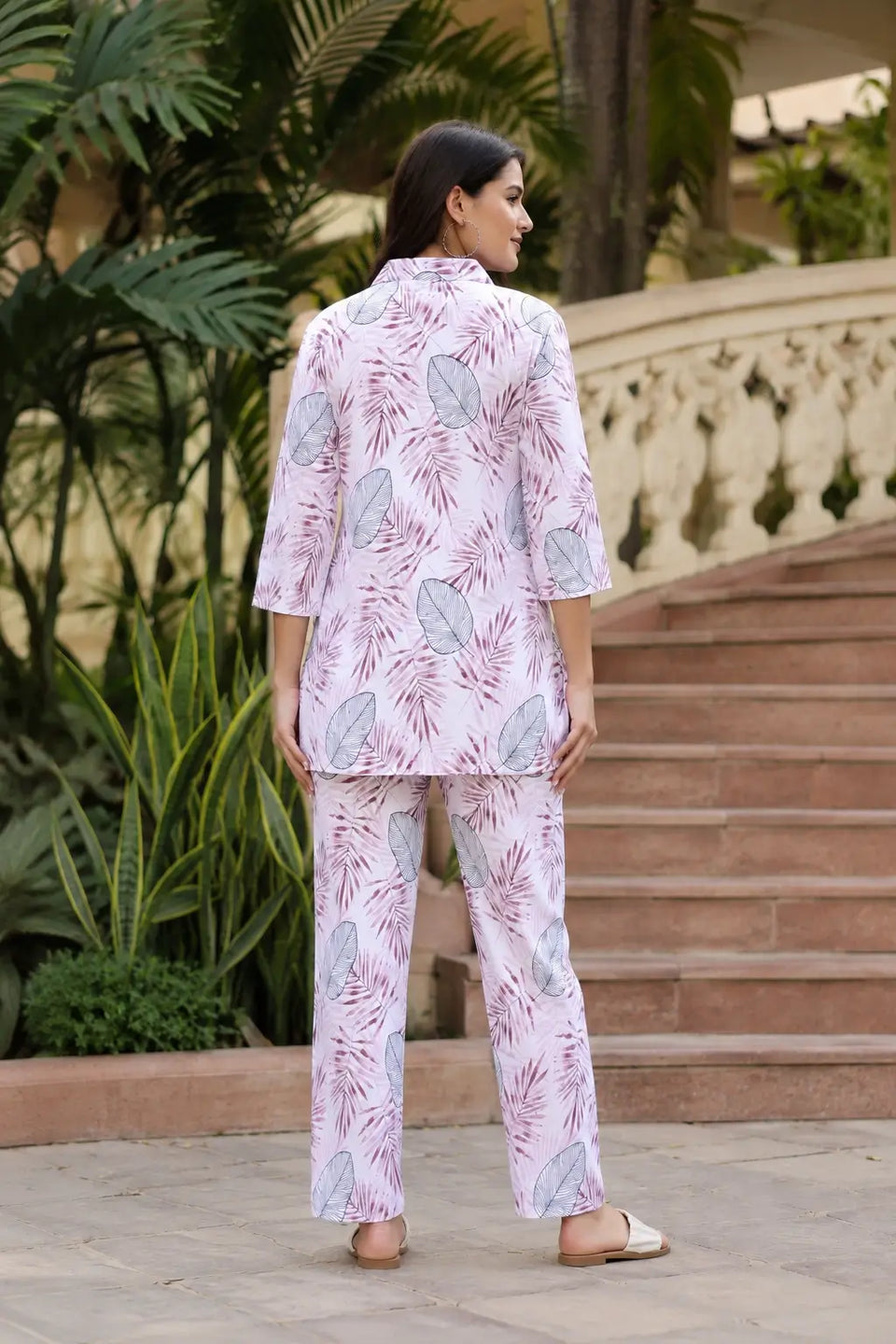 Back view of Rabric women pink rayon co-ord set featuring botanical palm leaf print, 3-4 sleeves shirt and comfortable straight fit pants
