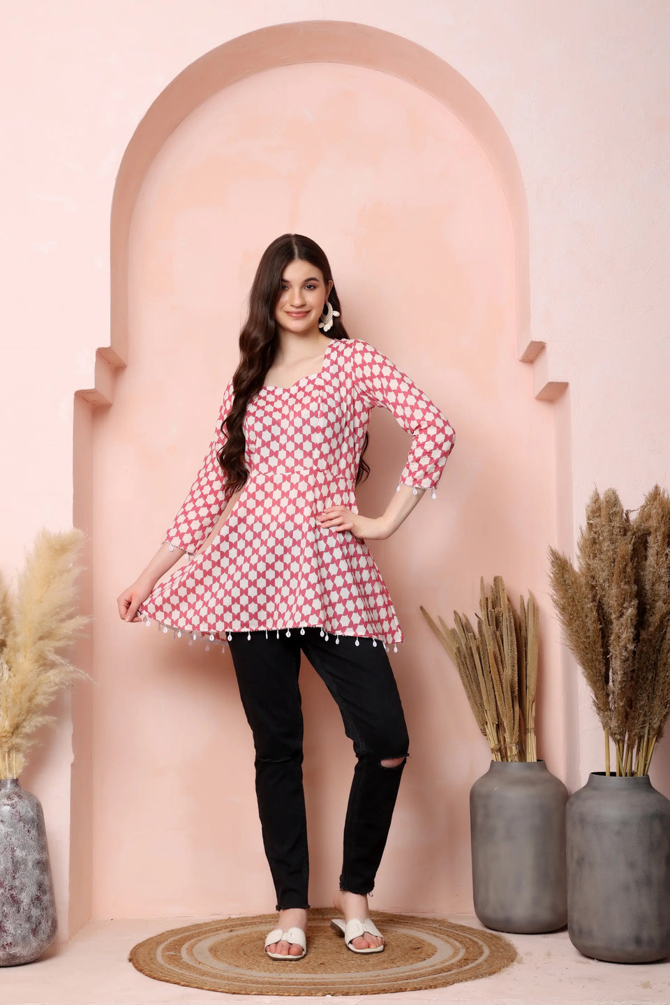 RABRIC pink and white pure cotton printed short kurti for women styled for a casual day-out look