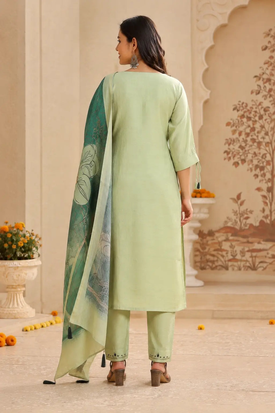 Back view of Rabric pista green cotton kurta pant set with dupatta for women showing long straight kurta and elegant fit