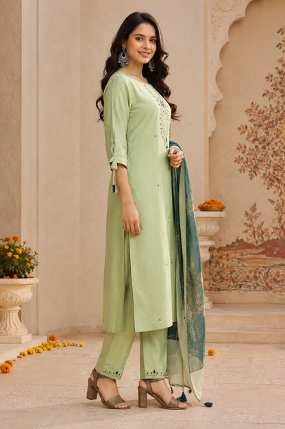 Side angle view of Rabric pista green cotton long kurta pant set with dupatta featuring straight fit and designer sleeves