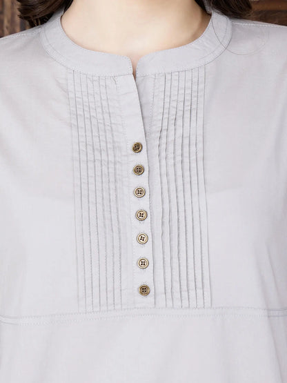 Close-up of brass button design on Rabric premium cotton kurti
