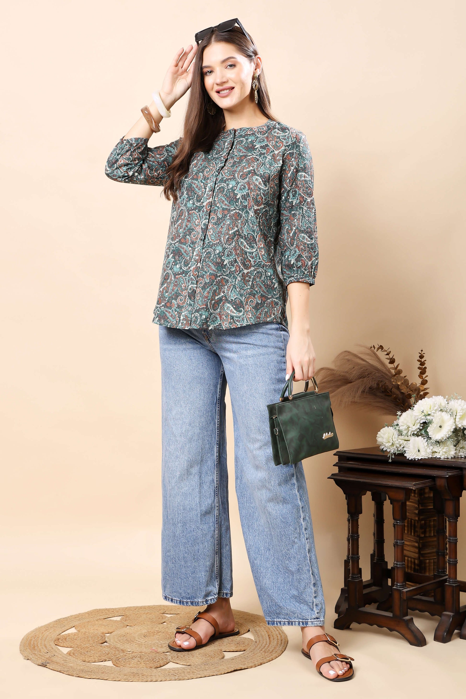 Women styling Rabric green short top with denim jeans