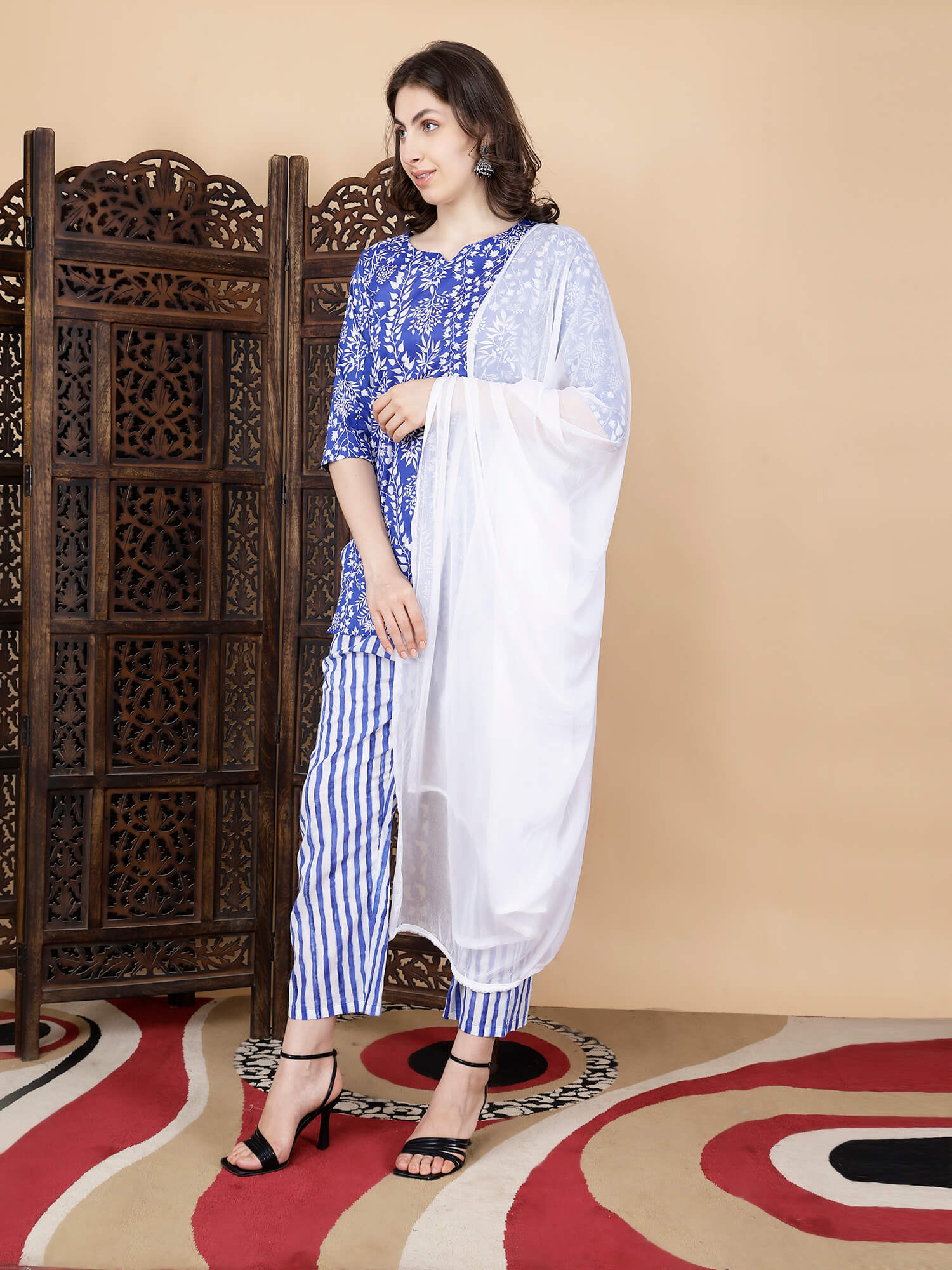 Side view of Rabric premium blue kurti and striped pant set