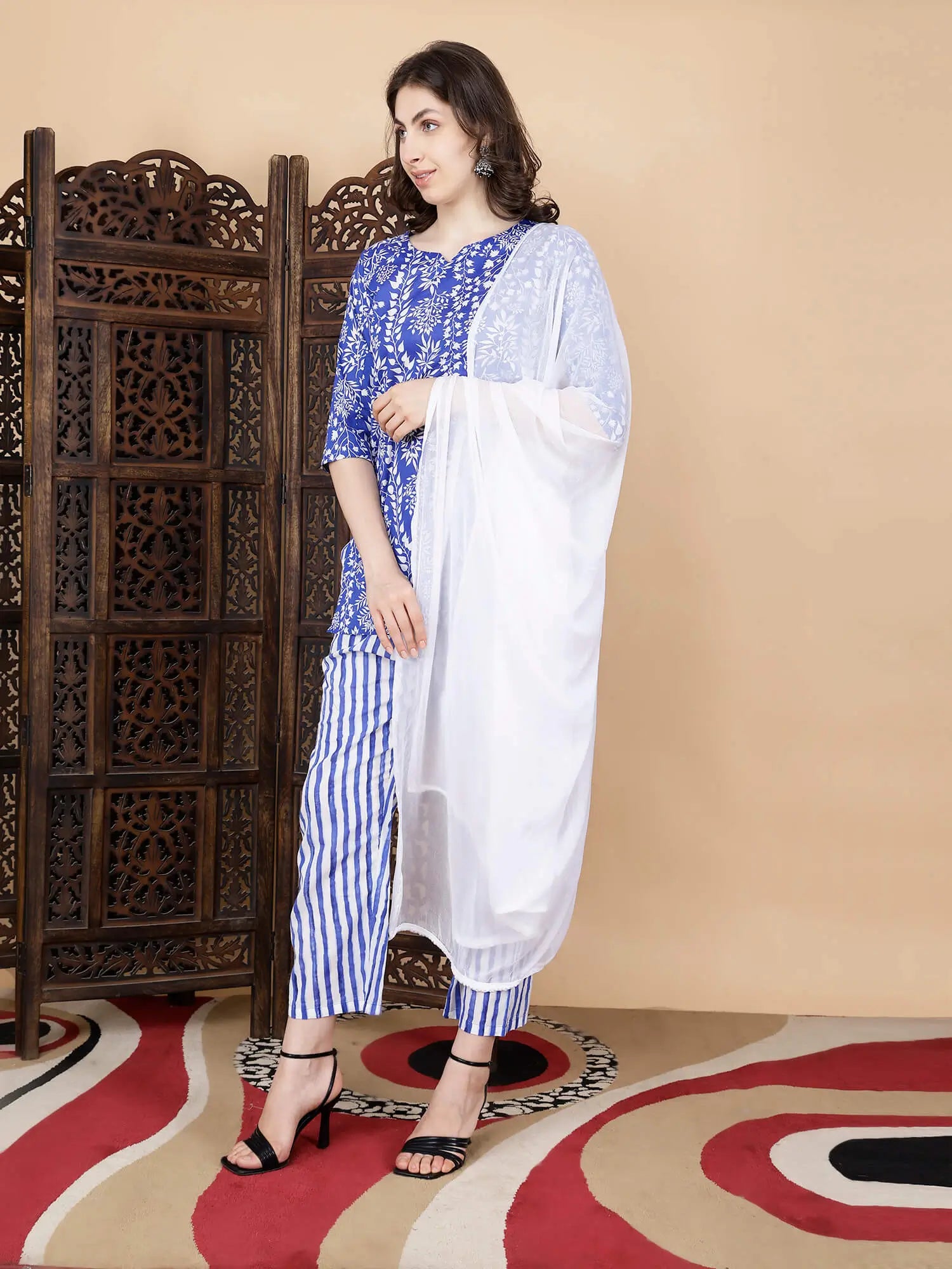 Round neckline with brass button detailing on Rabric kurti