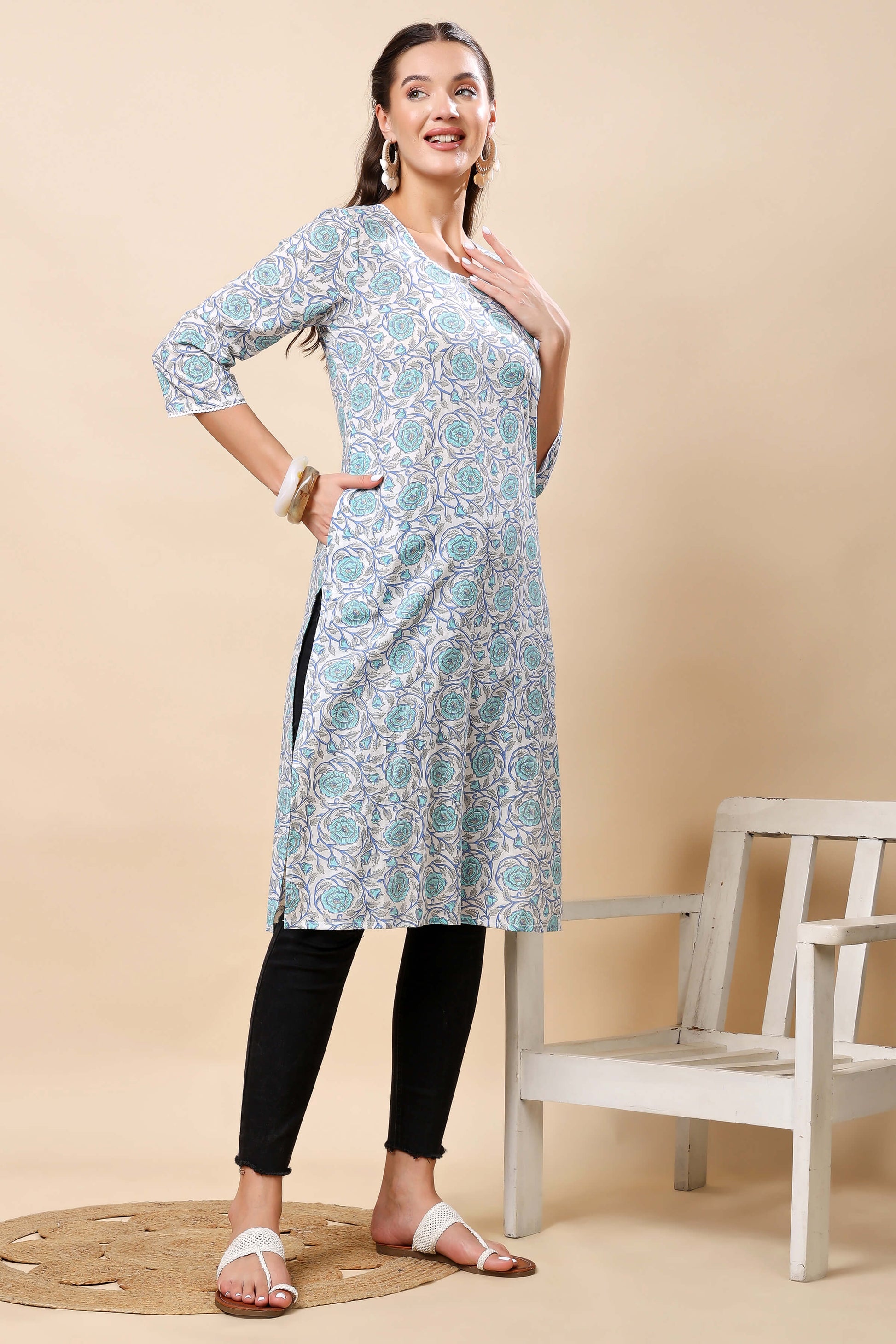 Side Slit Detailing on Rabric Blue Floral Long Kurti