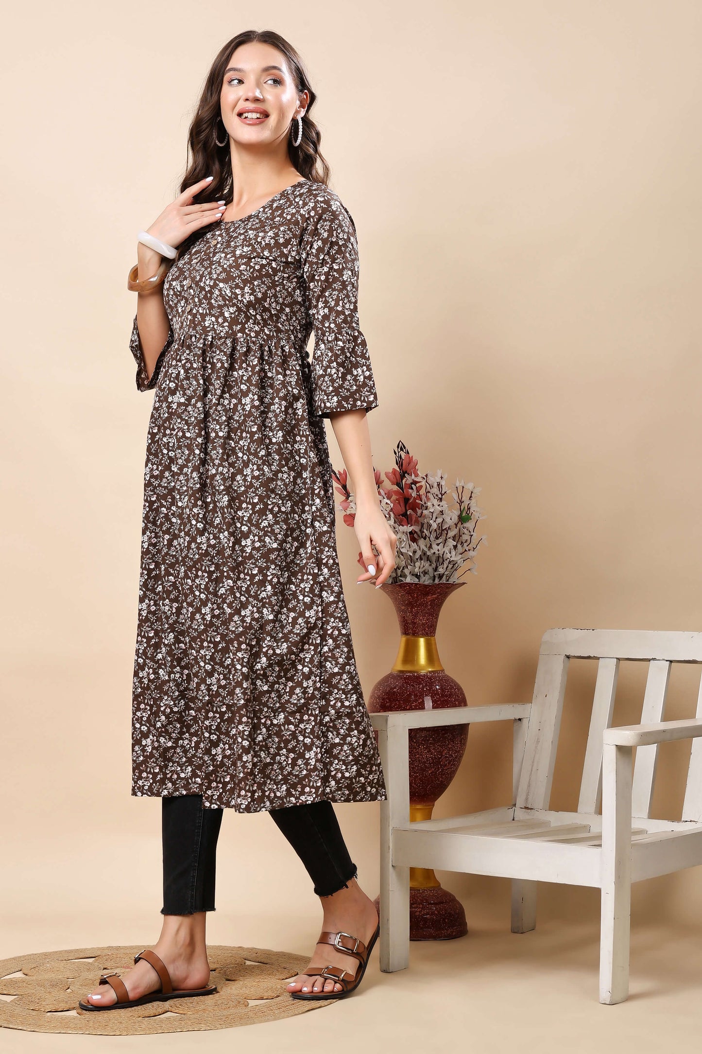 Flatlay Display of Rabric Brown Floral Kurti with Wooden Buttons