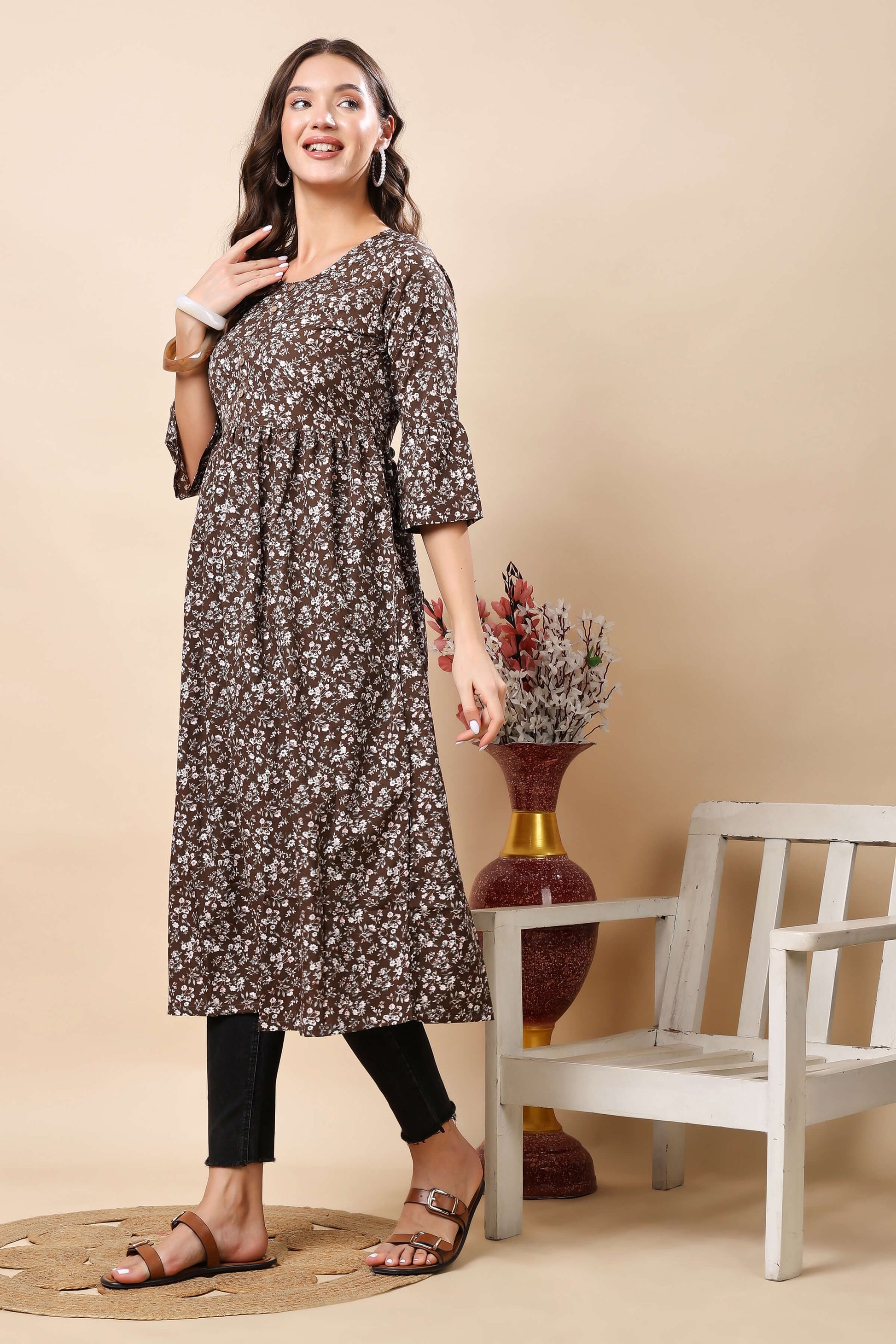 Flatlay Display of Rabric Brown Floral Kurti with Wooden Buttons